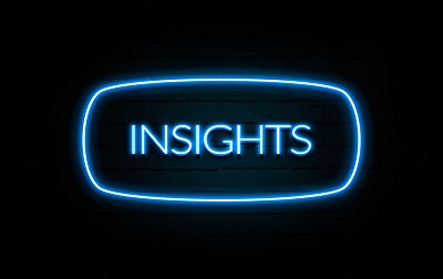 Insights Colorful Neon Sign On Brickwall